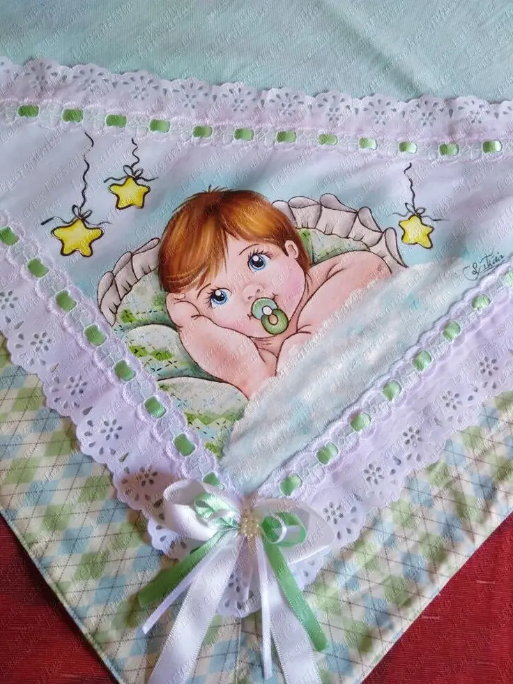 Manta pintada com bebê e estrelinhas